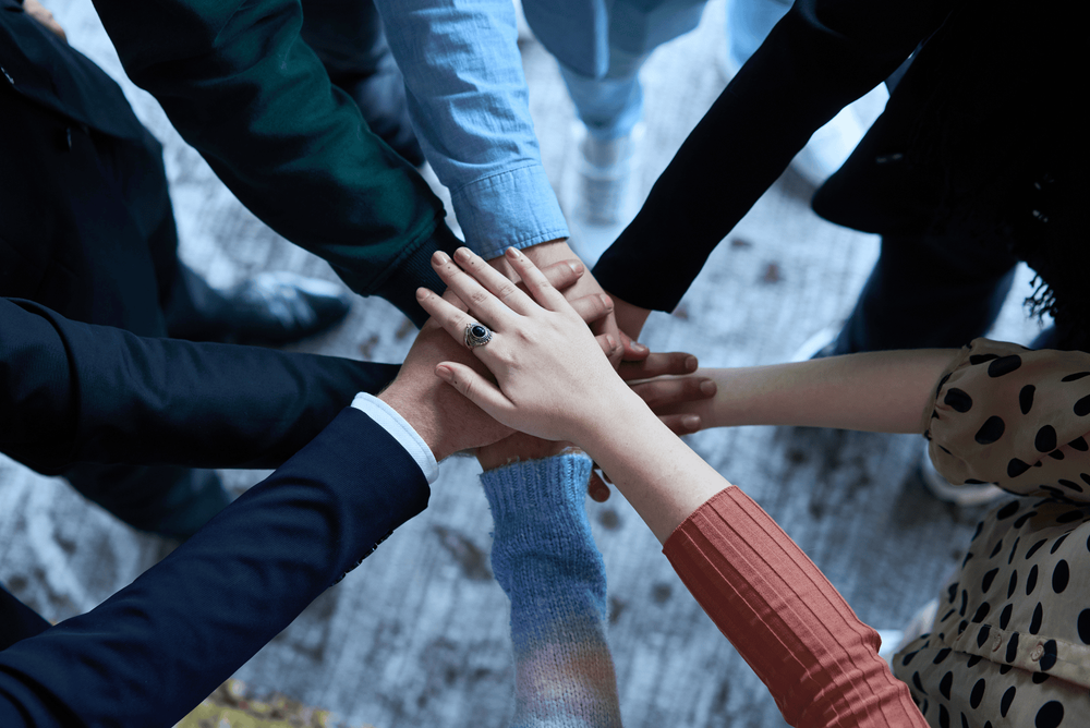 People joining hands